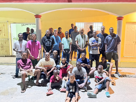 Teaching boys at Helping Hands to set up an e-commerce store