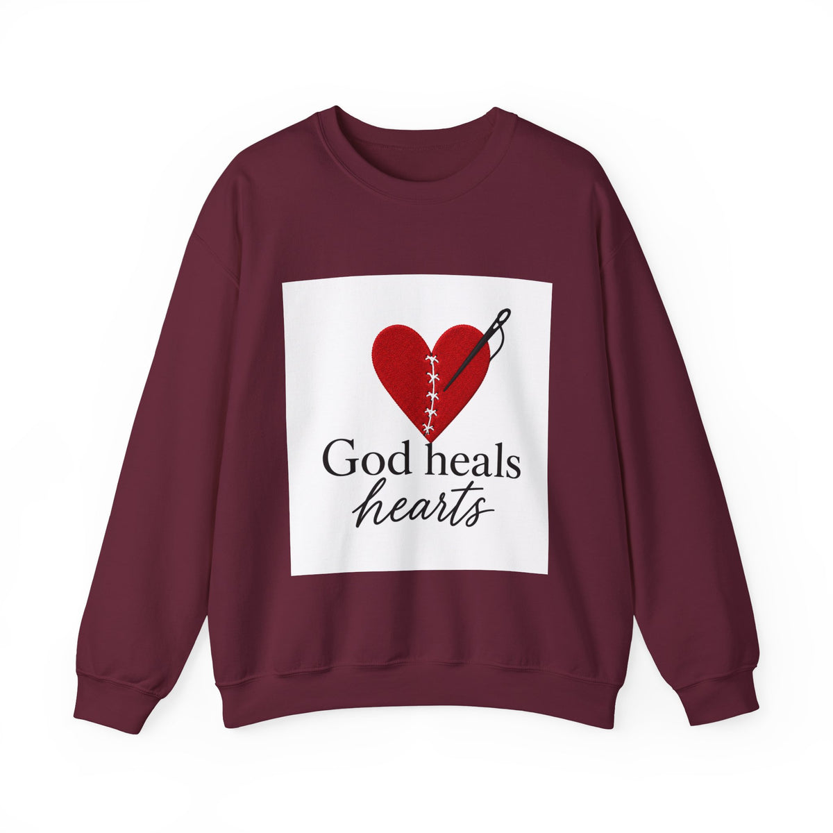 God Heals Hearts Crewneck Sweatshirt – Designed by Maxo
